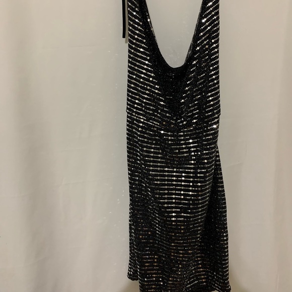 Kimcine Curve Dresses & Skirts - 3/$25💙💙 A black mini sequin  open back dress size 2XL